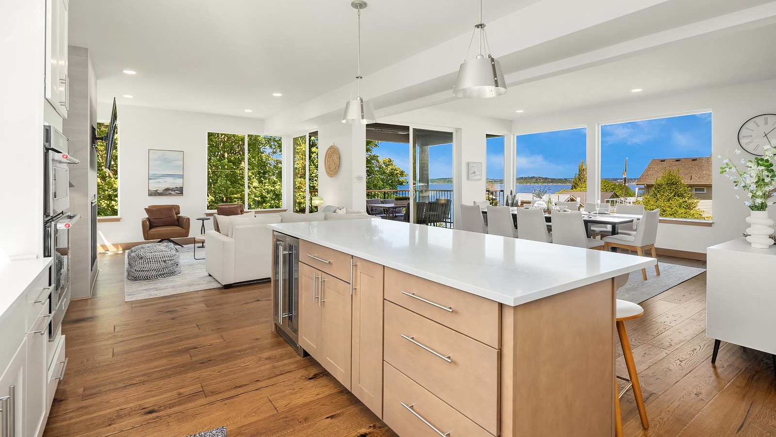 A furnished Seattle home with an open kitchen and water views