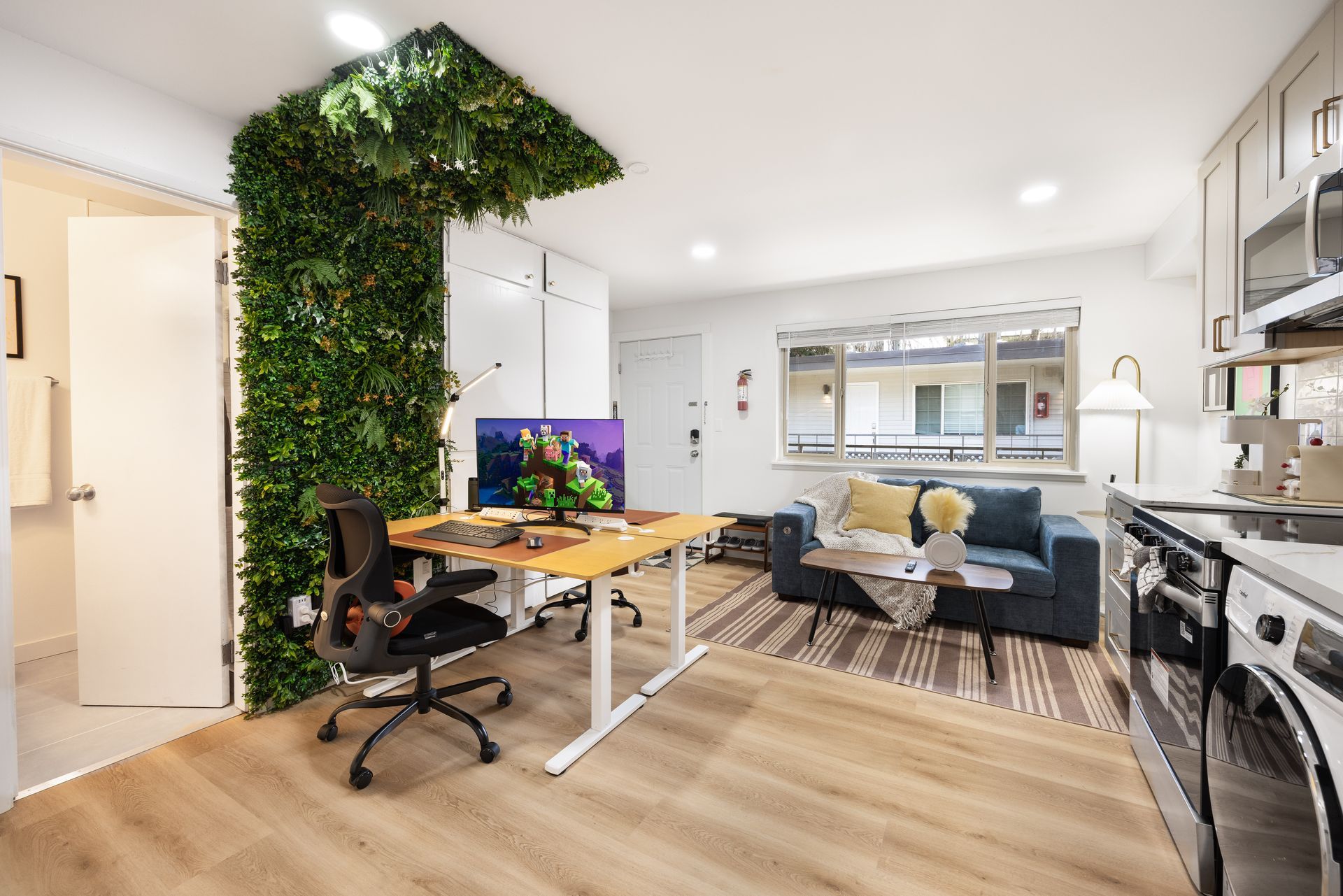 Living area and workspace in a furnished STAYOO suite